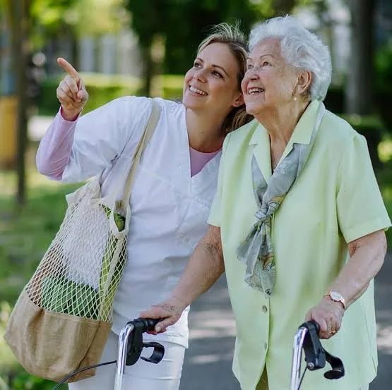 Care4Austin companion caregiver visiting with a senior client at home