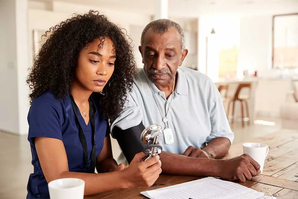 Care4Austin caregiver trained in memory care supporting a client with dementia